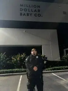 Safety Host Unit officer conducting nighttime patrol a a facility in Pico Rivera